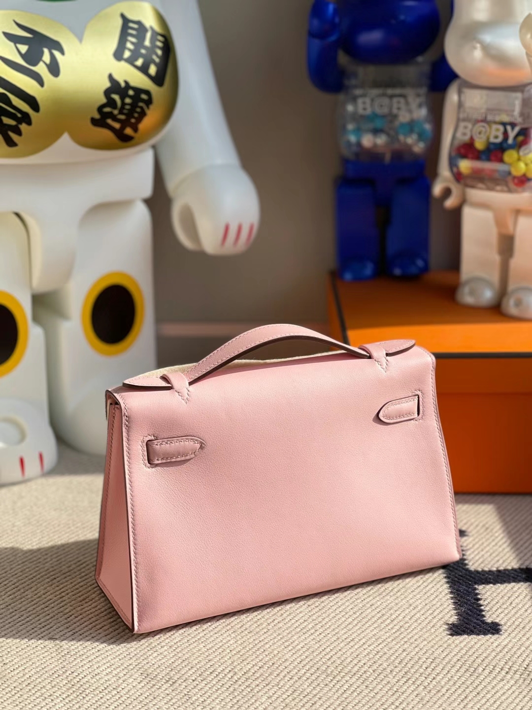 Hermès（爱马仕）Mini Kelly Pochette Swift皮 3Q 新粉色 金扣 22cm 全手工蜡线缝制 GHW