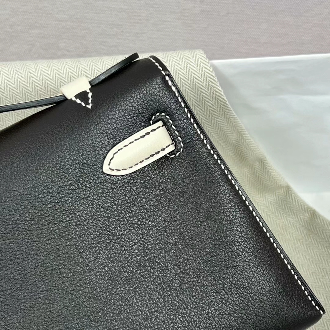 Hermès（爱马仕）Mini Kelly Pochette Swift皮 Ck89 黑色 拼 01 纯白 银扣 22cm 全手工蜡线缝制