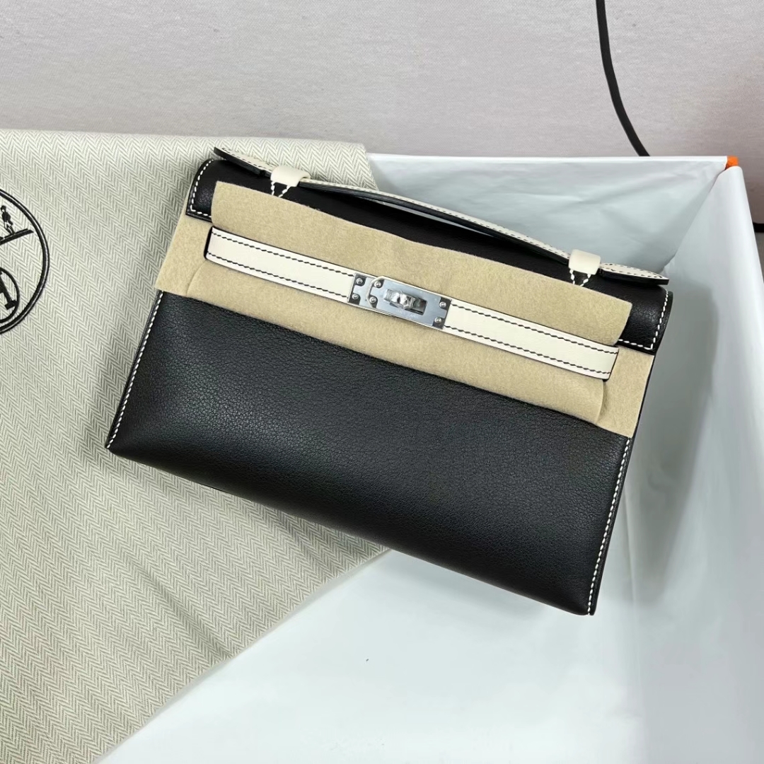 Hermès（爱马仕）Mini Kelly Pochette Swift皮 Ck89 黑色 拼 01 纯白 银扣 22cm 全手工蜡线缝制