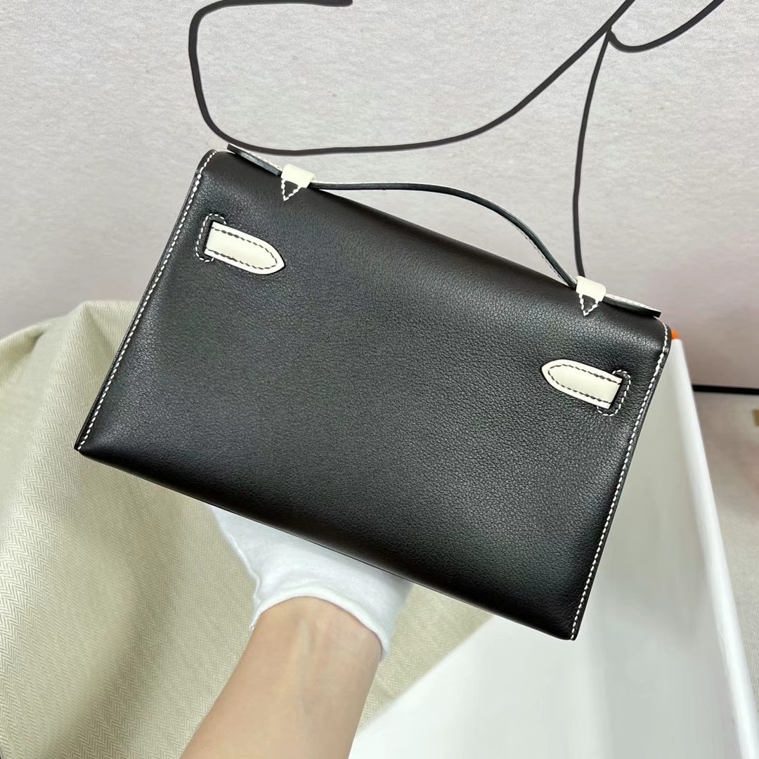 Hermès（爱马仕）Mini Kelly Pochette Swift皮 Ck89 黑色 拼 01 纯白 银扣 22cm 全手工蜡线缝制