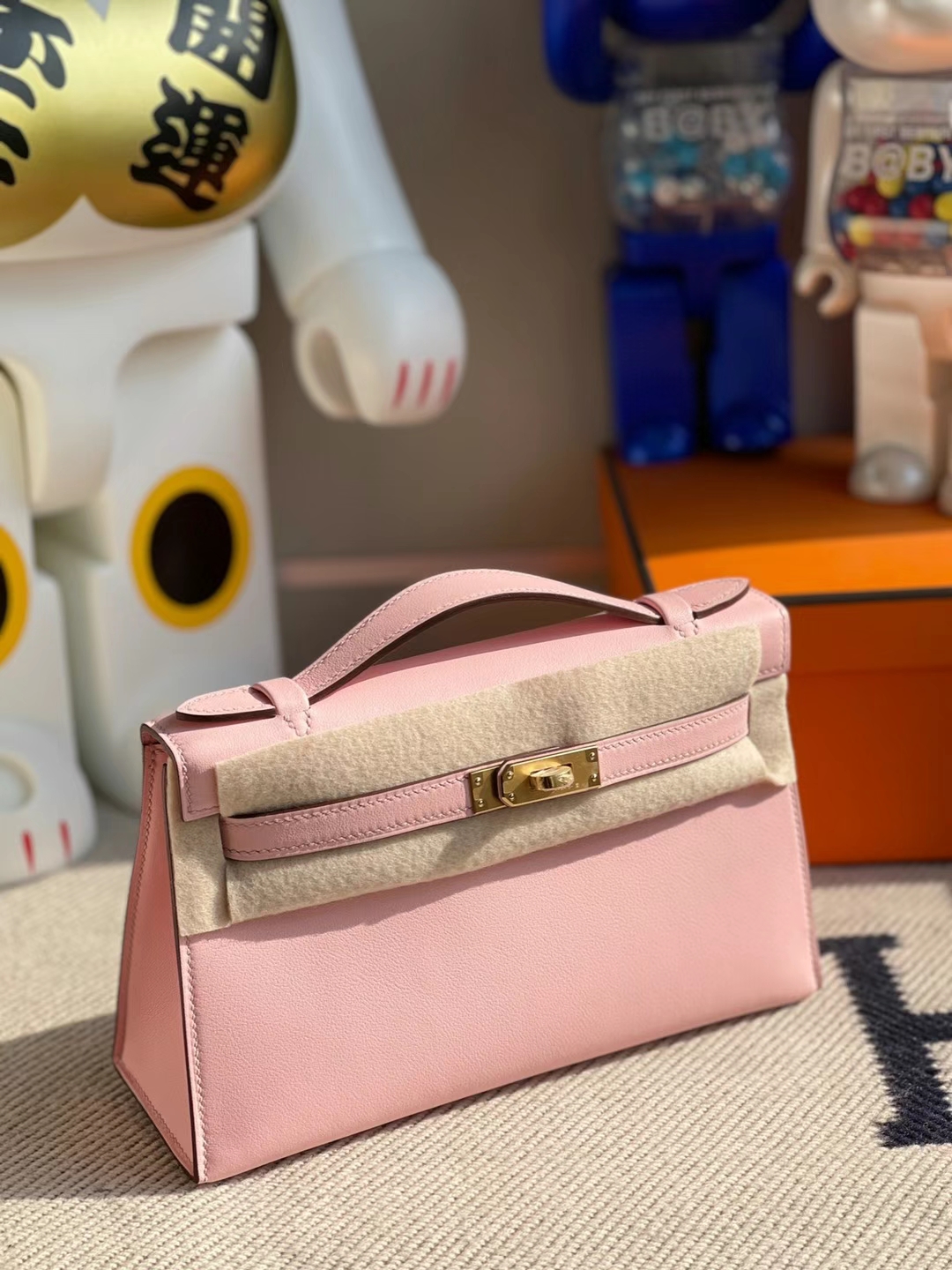 Hermès（爱马仕）Mini Kelly Pochette Swift皮 3Q 新粉色 金扣 22cm 全手工蜡线缝制 GHW