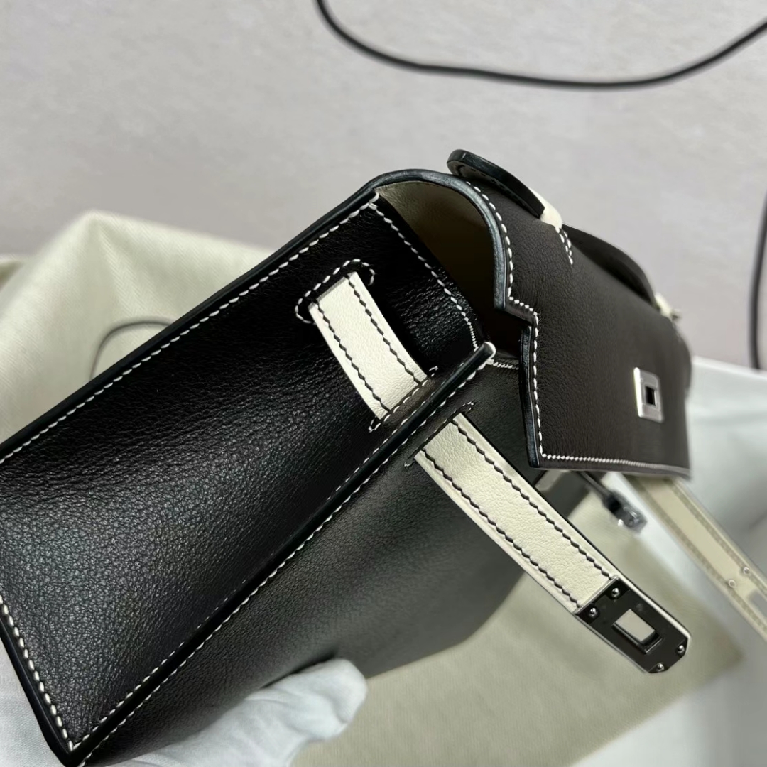 Hermès（爱马仕）Mini Kelly Pochette Swift皮 Ck89 黑色 拼 01 纯白 银扣 22cm 全手工蜡线缝制