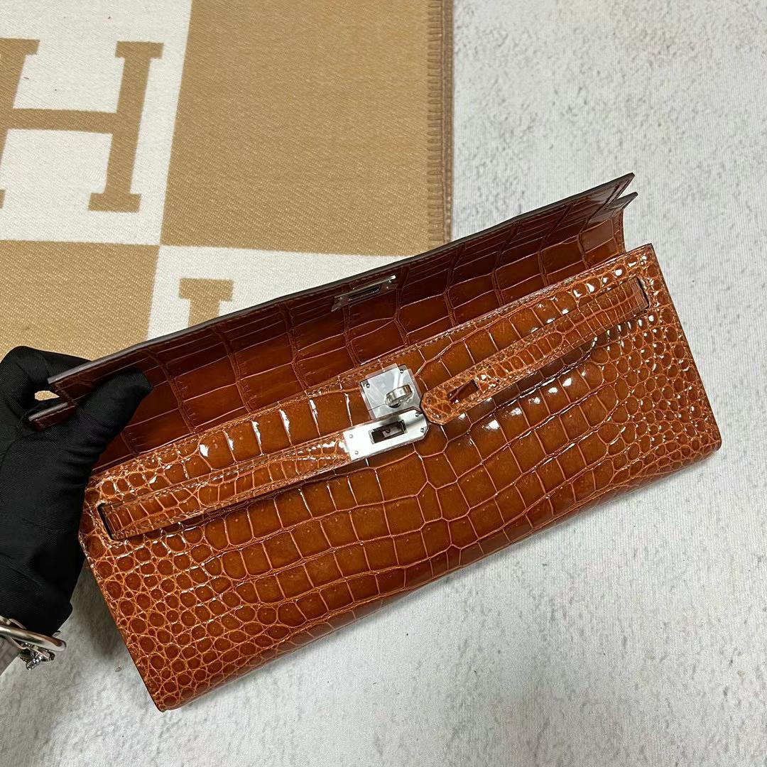 Hermès（爱马仕）Kelly cut 亮面倒v澳洲湾鳄 cc33 蜜糖棕 银扣 全手工蜡线缝制 phw 31cm