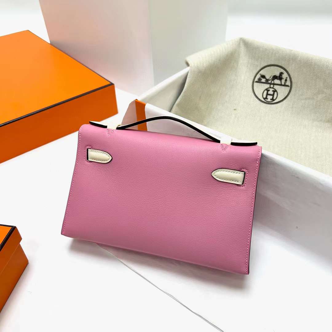 Hermès（爱马仕）Mini Kelly Pochette Swift 5P 樱花粉 内拼 i2 奶油白 银扣 22cm 全手工蜡线缝制 Phw