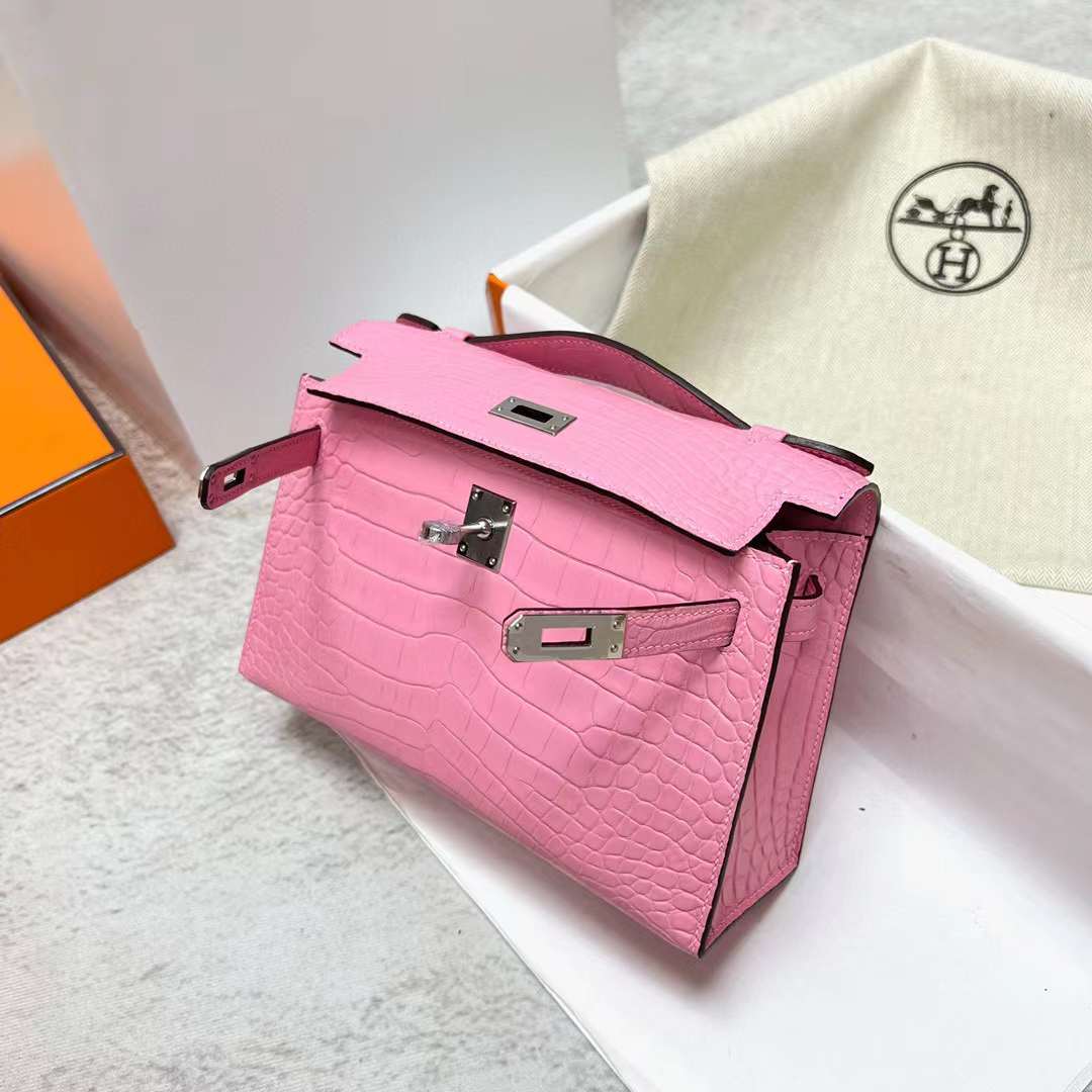 Hermès（爱马仕）Mini Kelly Pochette 雾面美洲鳄鱼皮 5P 樱花粉 银扣 22cm 全手工蜡线缝制 Phw