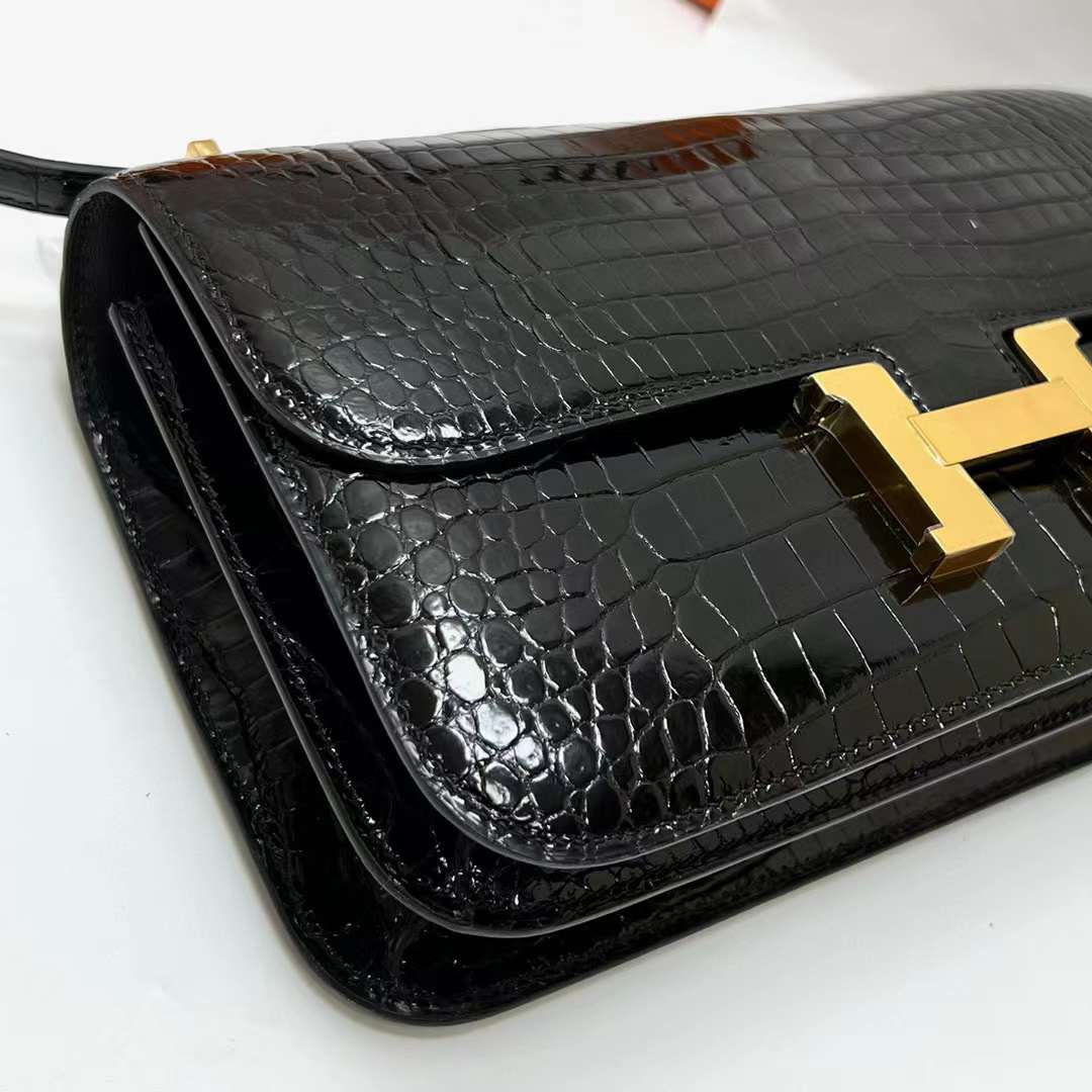 Hermès（爱马仕）Constance elan 亮面倒v澳洲湾鳄鱼 shiny porosus crocodile Ck89 黑色 金扣 26cm 全手工蜡线缝制
