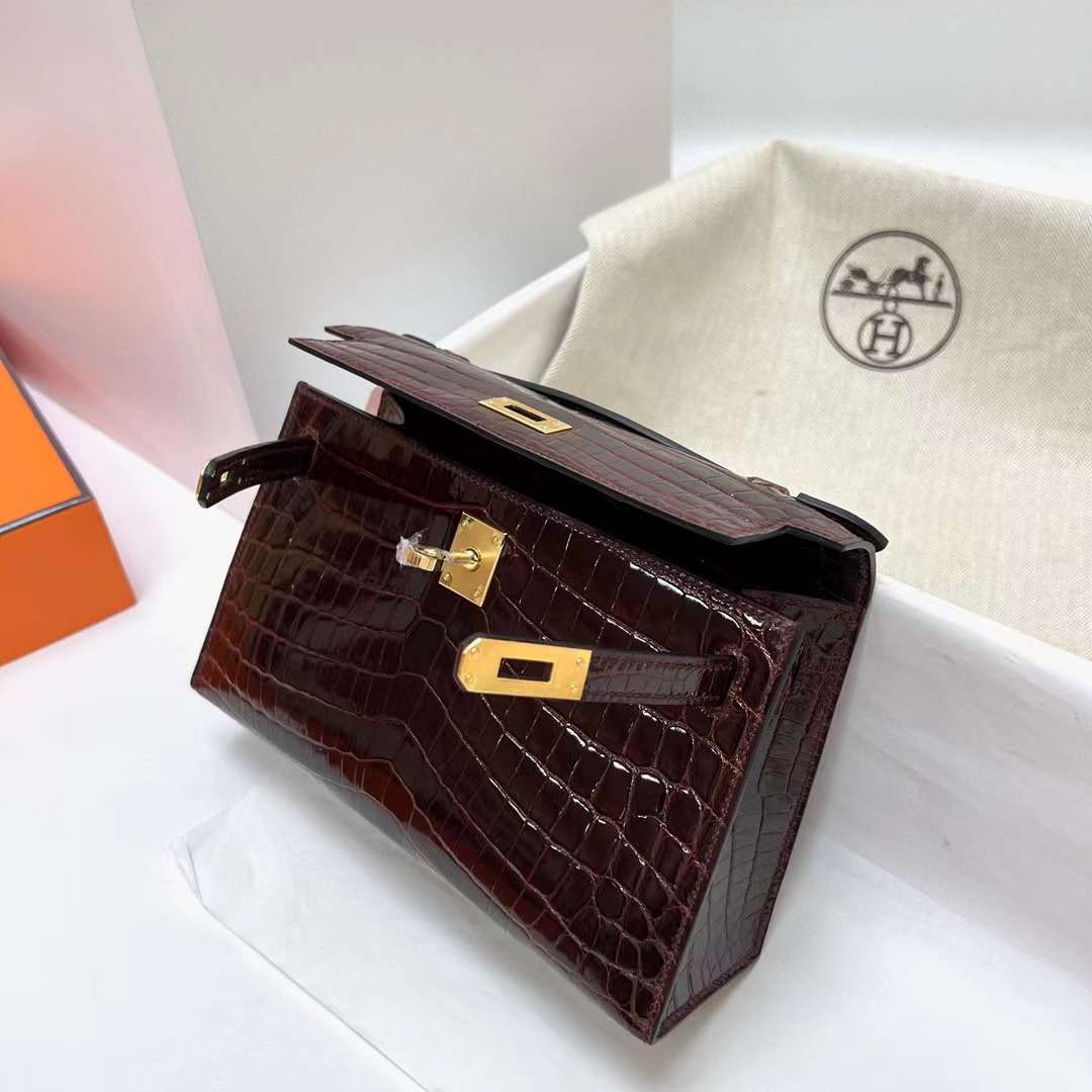 Hermès（爱马仕）Mini Kelly Pochette 亮面尼罗鳄鱼 Shiny nilo crocodile cc31 蜜糖棕 金扣 22cm 全手工蜡线缝制 Ghw
