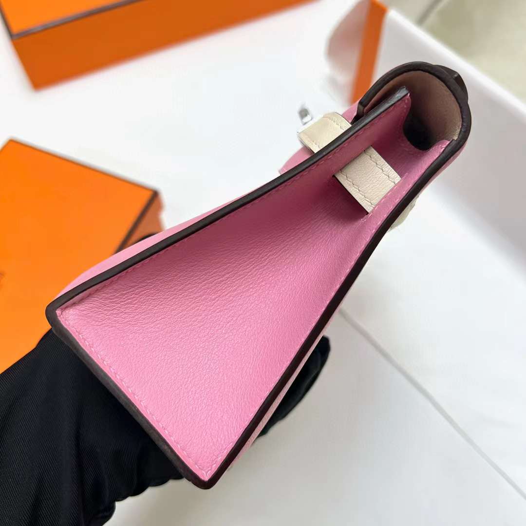 Hermès（爱马仕）Mini Kelly Pochette Swift 5P 樱花粉 内拼 i2 奶油白 银扣 22cm 全手工蜡线缝制 Phw