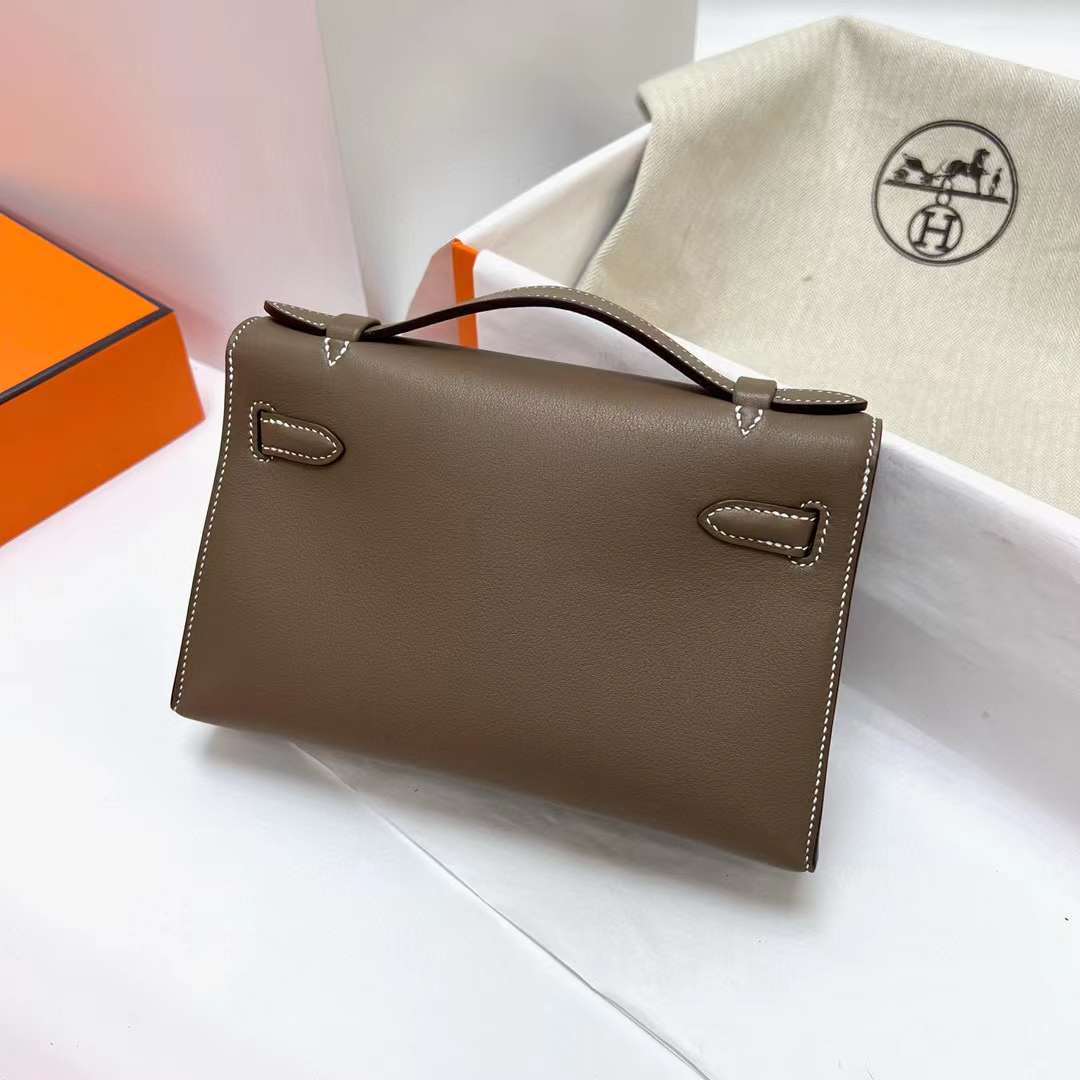 Hermès（爱马仕）Mini Kelly Pochette Swift Ck18 大象灰 内拼 5P 樱花粉 银扣 22cm 全手工蜡线缝制 phw