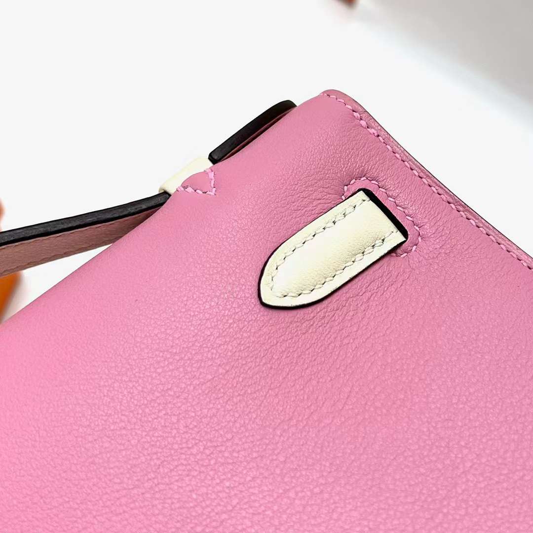 Hermès（爱马仕）Mini Kelly Pochette Swift 5P 樱花粉 内拼 i2 奶油白 银扣 22cm 全手工蜡线缝制 Phw