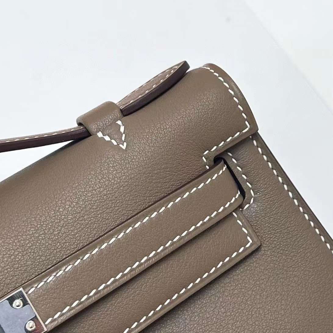 Hermès（爱马仕）Mini Kelly Pochette Swift Ck18 大象灰 内拼 9D 琥珀黄 银扣 22cm 全手工蜡线缝制 phw