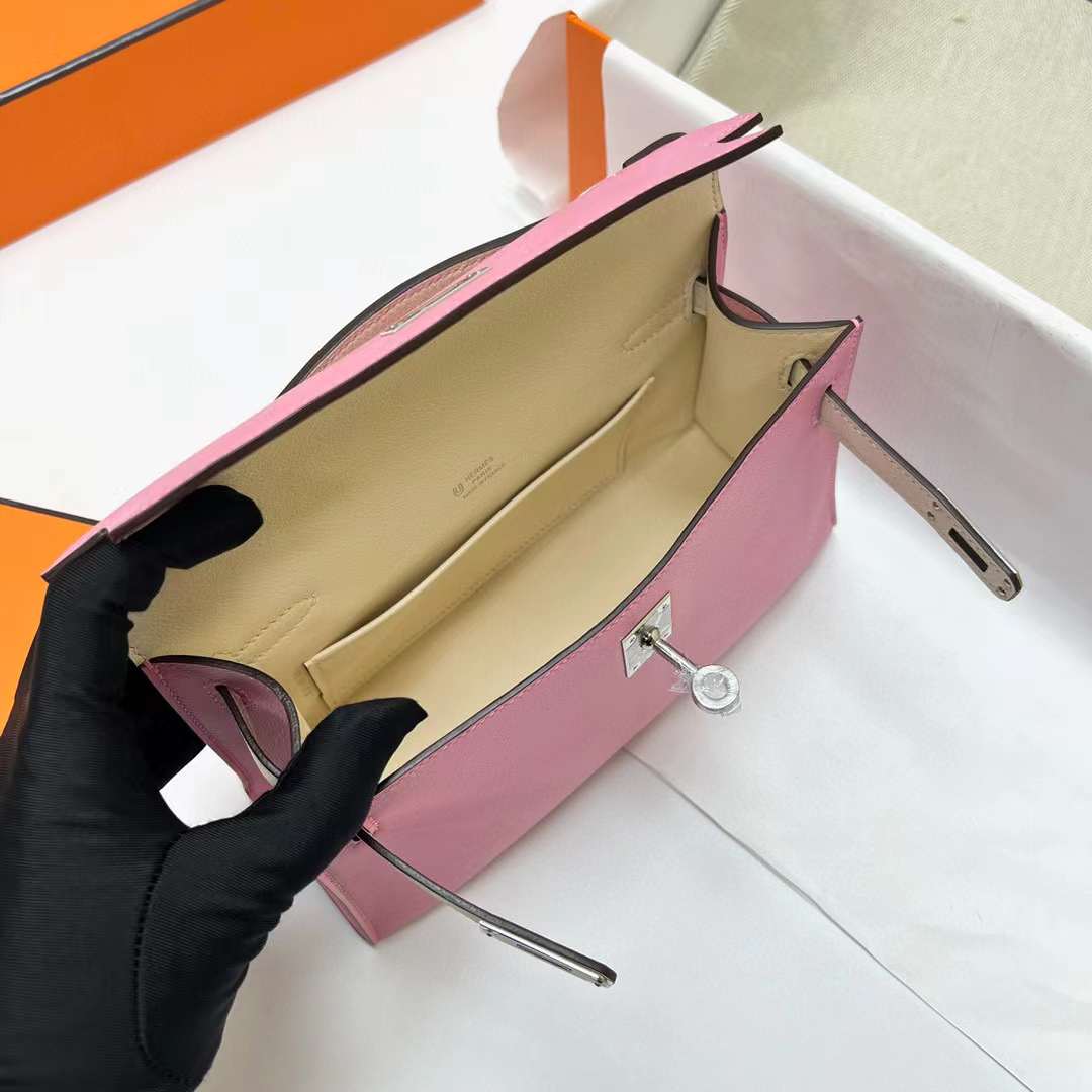 Hermès（爱马仕）Mini Kelly Pochette Swift 5P 樱花粉 内拼 i2 奶油白 银扣 22cm 全手工蜡线缝制 Phw