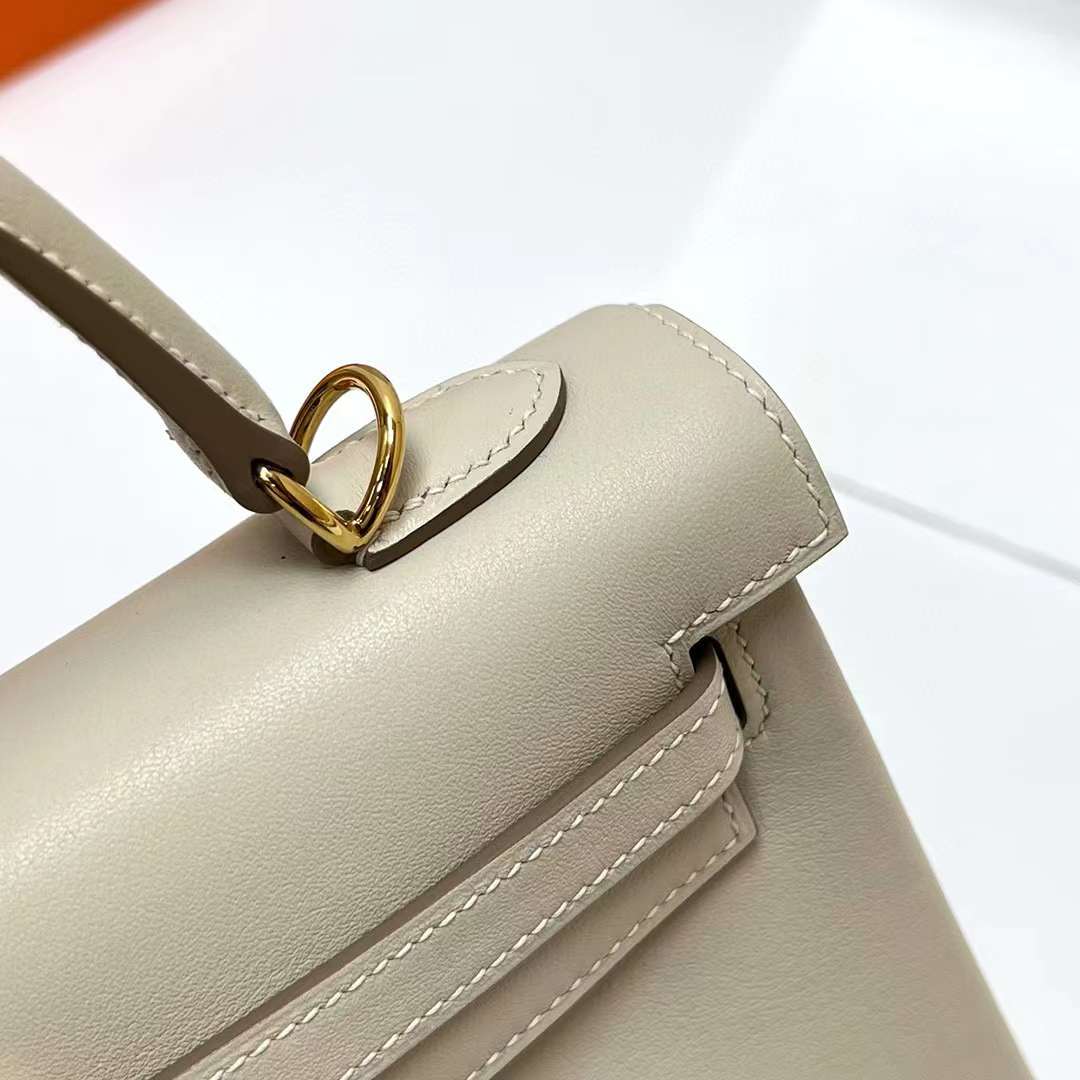 Hermès（爱马仕）Kelly 凯莉包 Swift Ck10 奶昔白 金扣 25cm 全手工蜡线缝制 Ghw