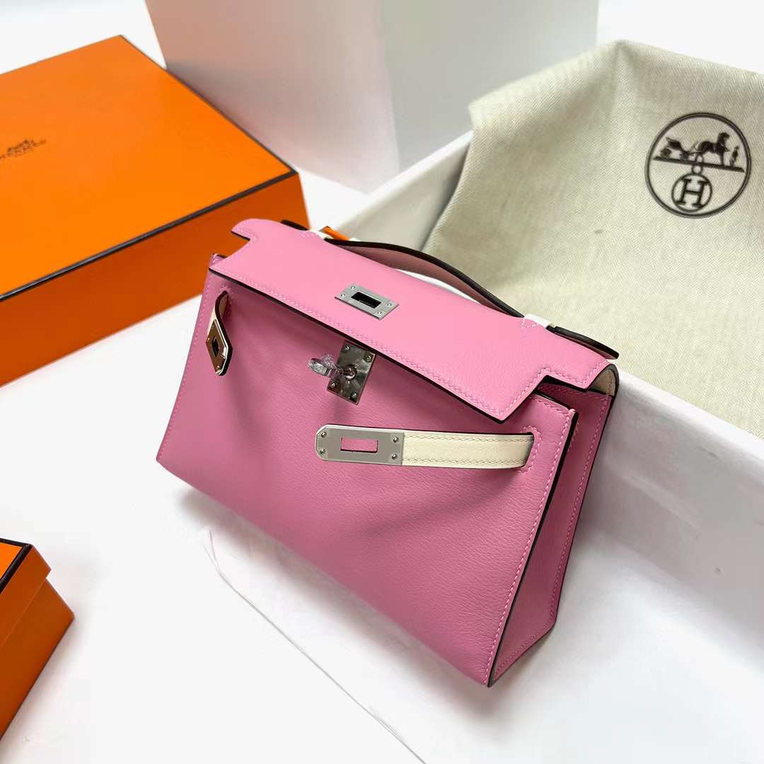 Hermès（爱马仕）Mini Kelly Pochette Swift 5P 樱花粉 内拼 i2 奶油白 银扣 22cm 全手工蜡线缝制 Phw