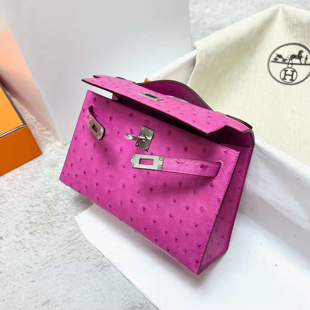 Hermès（爱马仕）Mini Kelly Pochette Ostrich 鸵鸟皮 9i 玉兰粉 银扣 22cm 全手工蜡线缝制 Phw