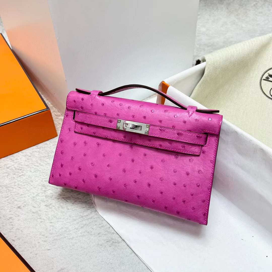 Hermès（爱马仕）Mini Kelly Pochette Ostrich 鸵鸟皮 9i 玉兰粉 银扣 22cm 全手工蜡线缝制 Phw