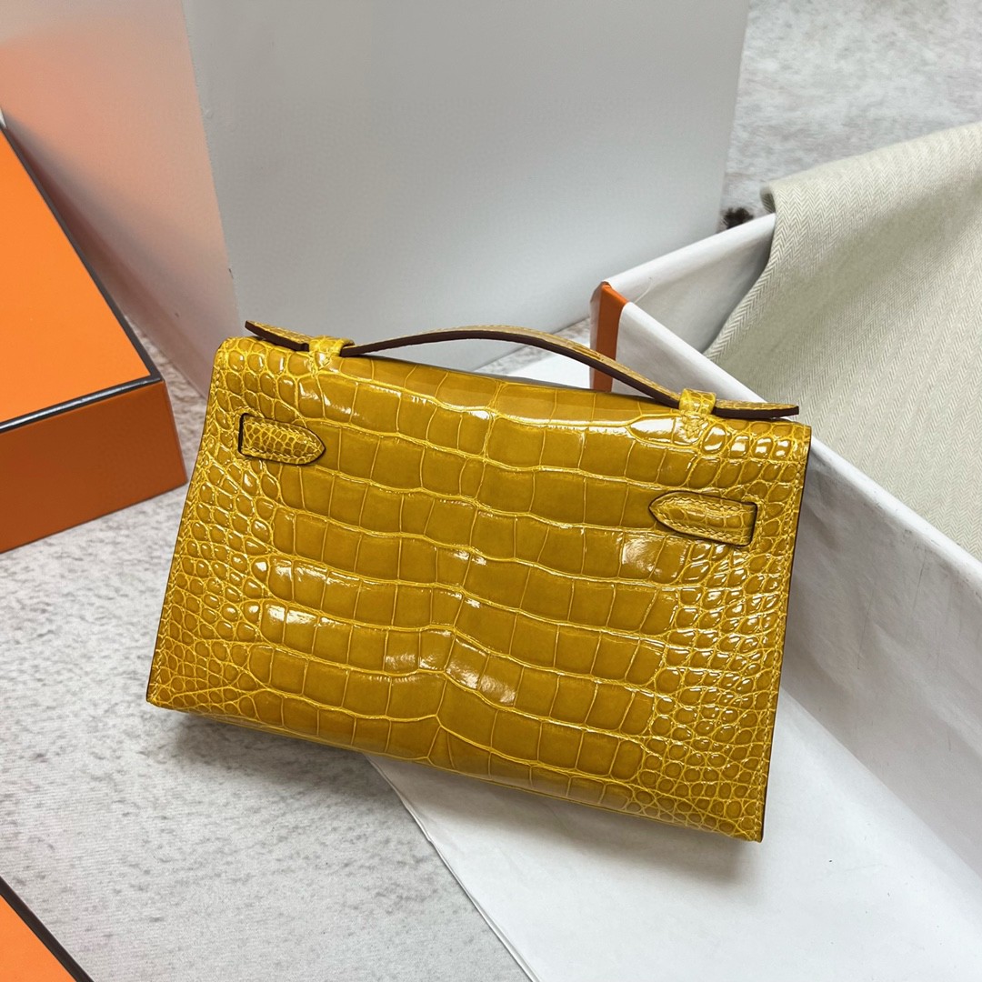 Hermès（爱马仕）Mini pochette Alligator shiny 亮面鳄鱼皮 9D 琥珀黄 Ambre 金扣 GHW 22cm 手拿包 晚宴包