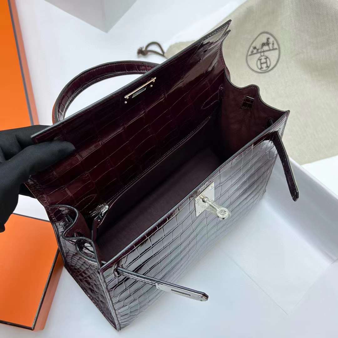 Hermès（爱马仕）Kelly 凯莉包 亮面尼罗鳄鱼皮 Shiny Nilo Crocodile Ck57 波尔多酒红 银扣 28cm 全手工蜡线缝制 Phw