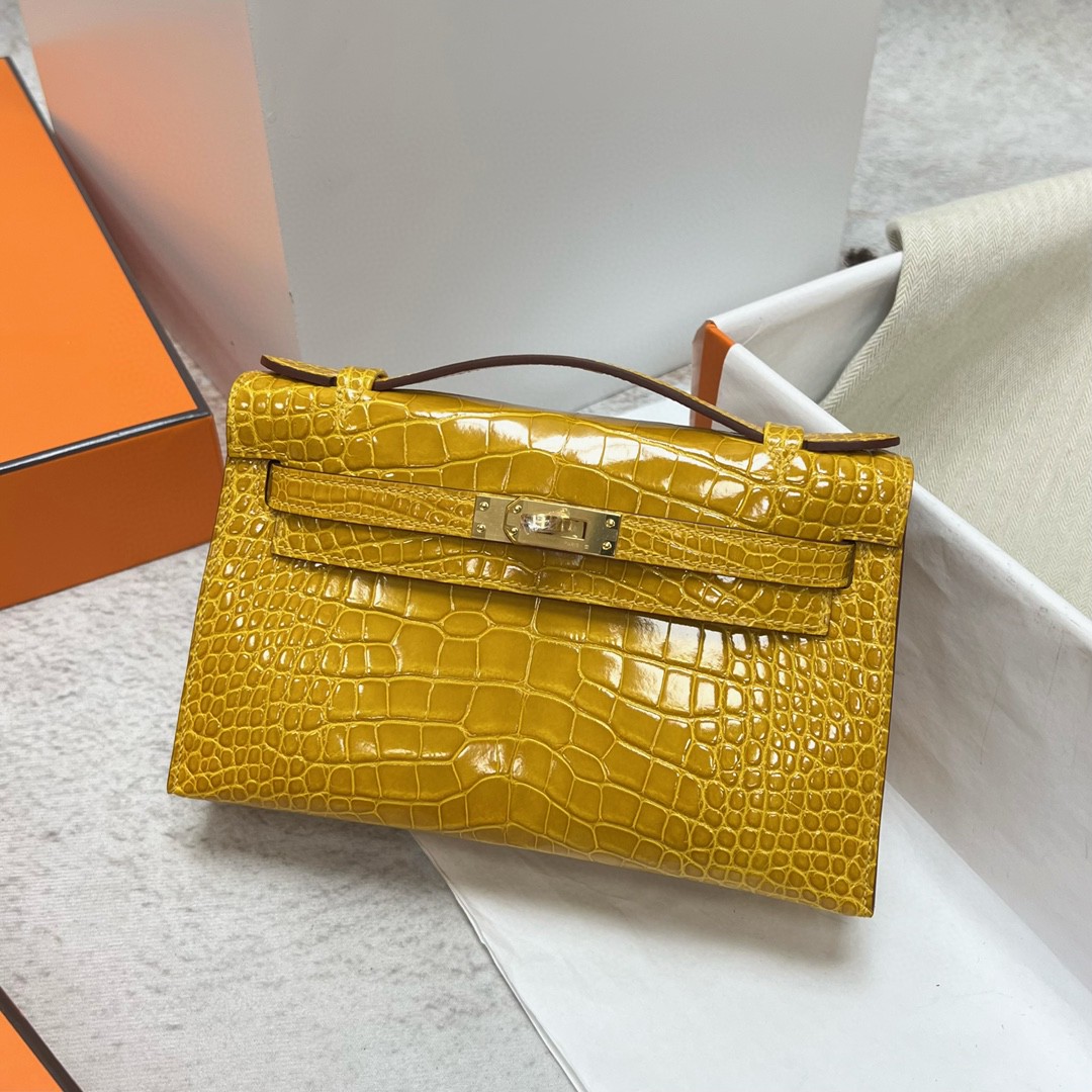 Hermès（爱马仕）Mini pochette Alligator shiny 亮面鳄鱼皮 9D 琥珀黄 Ambre 金扣 GHW 22cm 手拿包 晚宴包