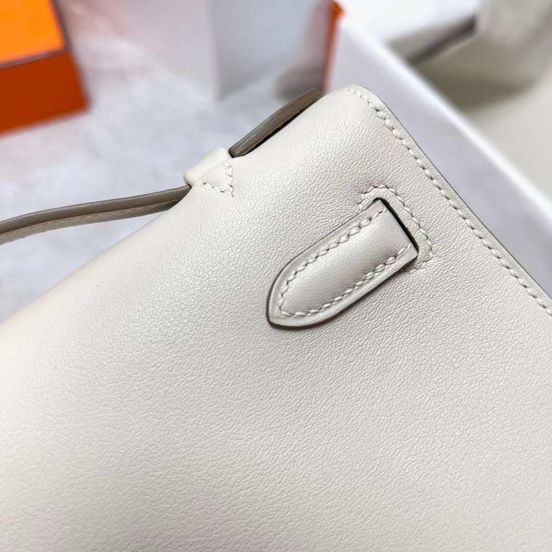 Hermès（爱马仕）Mini Kelly Pochette Swift Ck10 奶昔白 银扣 22cm 全手工蜡线缝制 Phw
