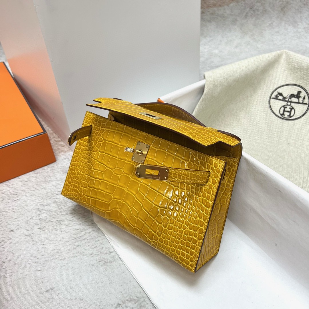 Hermès（爱马仕）Mini pochette Alligator shiny 亮面鳄鱼皮 9D 琥珀黄 Ambre 金扣 GHW 22cm 手拿包 晚宴包