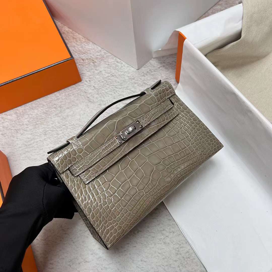 Hermès（爱马仕）Mini Kelly Pochette 亮面美洲鳄鱼皮 Ck81 斑鸠灰 银扣 22cm 全手工蜡线缝制 Phw