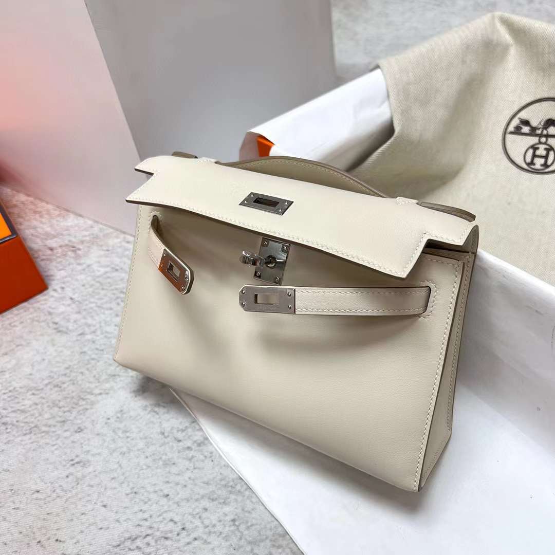 Hermès（爱马仕）Mini Kelly Pochette Swift Ck10 奶昔白 银扣 22cm 全手工蜡线缝制 Phw