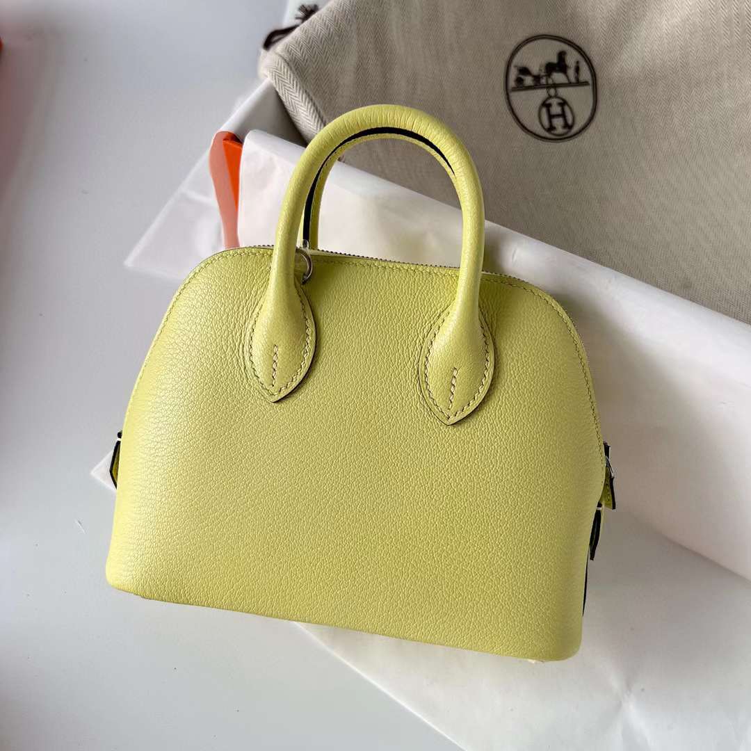 Hermès（爱马仕）Mini Bolide 迷你保龄球包 Chevre 山羊皮 R9 嫩芽黄 银扣 19cm 全手工蜡线缝制 Phw