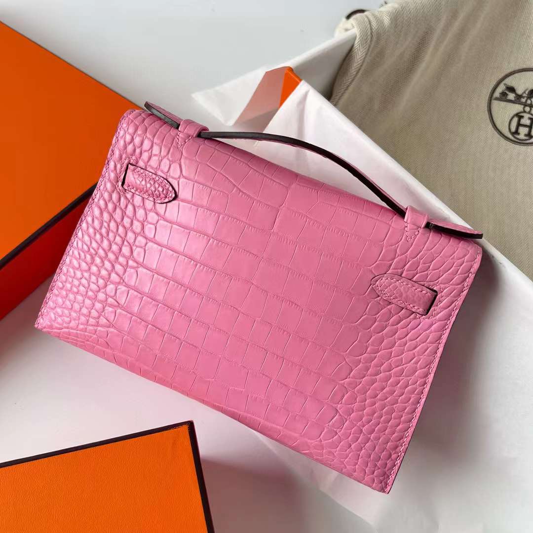 Hermès（爱马仕）Mini Kelly Pochette 雾面美洲鳄鱼皮 5P 樱花粉 银扣 22cm 全手工蜡线缝制 Phw