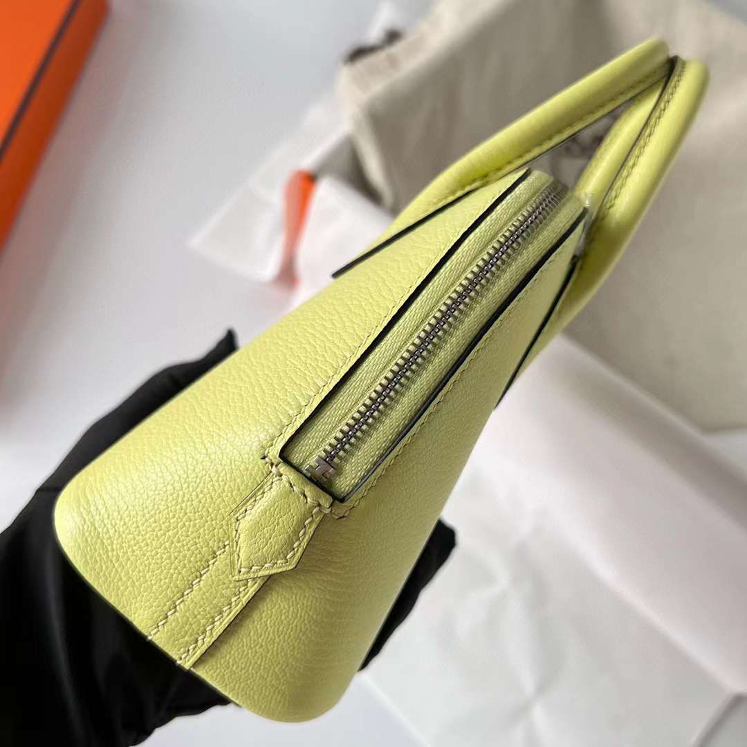Hermès（爱马仕）Mini Bolide 迷你保龄球包 Chevre 山羊皮 R9 嫩芽黄 银扣 19cm 全手工蜡线缝制 Phw