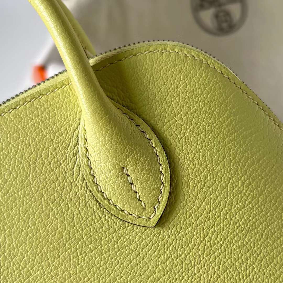 Hermès（爱马仕）Mini Bolide 迷你保龄球包 Chevre 山羊皮 R9 嫩芽黄 银扣 19cm 全手工蜡线缝制 Phw