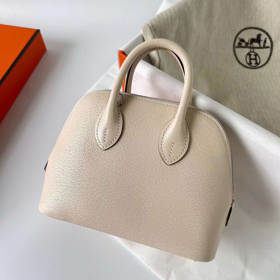 Hermès（爱马仕）Mini Bolide 迷你保龄球包 Chevre 进口山羊皮 I2 奶油白 银扣 19cm 全手工蜡线缝制 Phw
