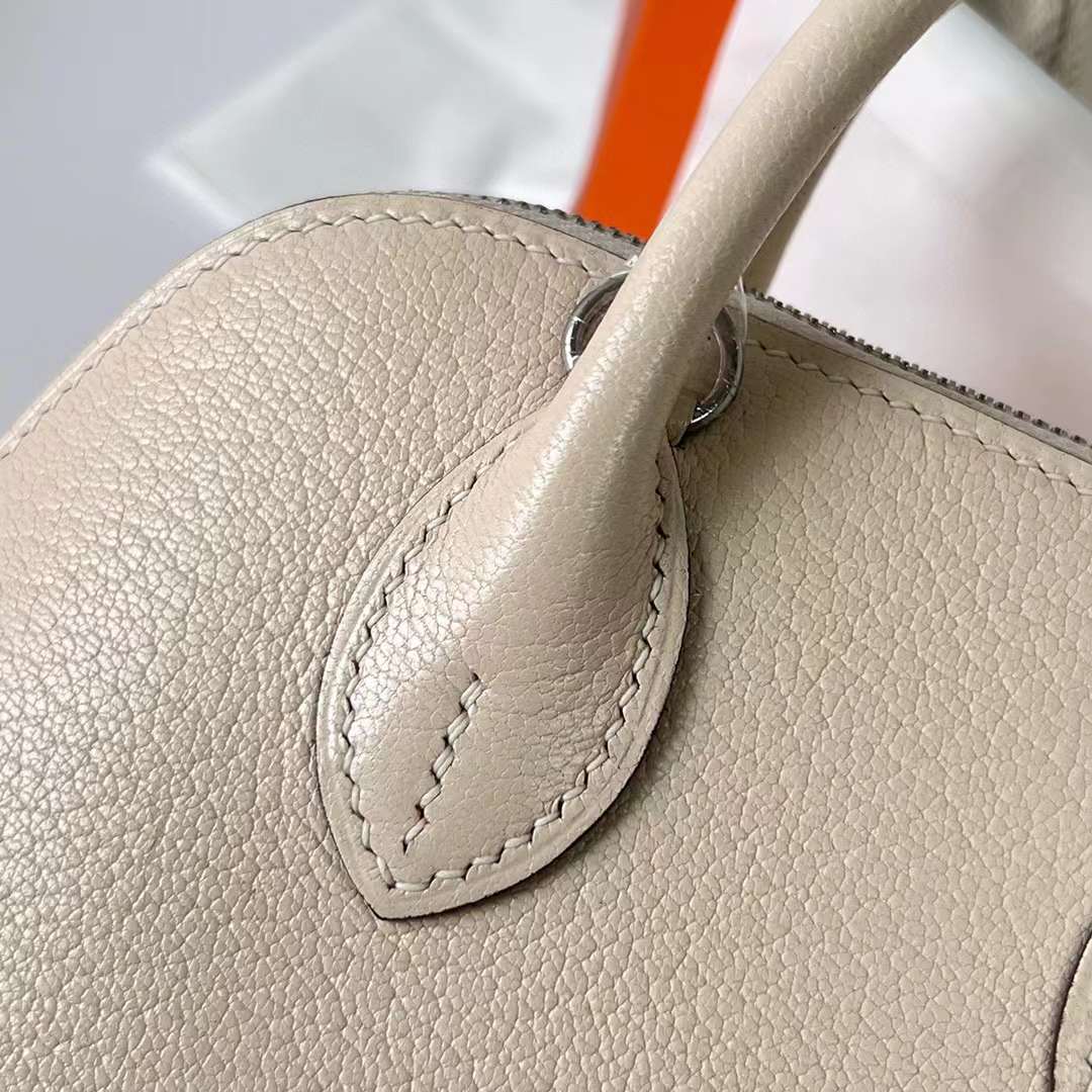 Hermès（爱马仕）Mini Bolide 迷你保龄球包 Chevre 进口山羊皮 I2 奶油白 银扣 19cm 全手工蜡线缝制 Phw