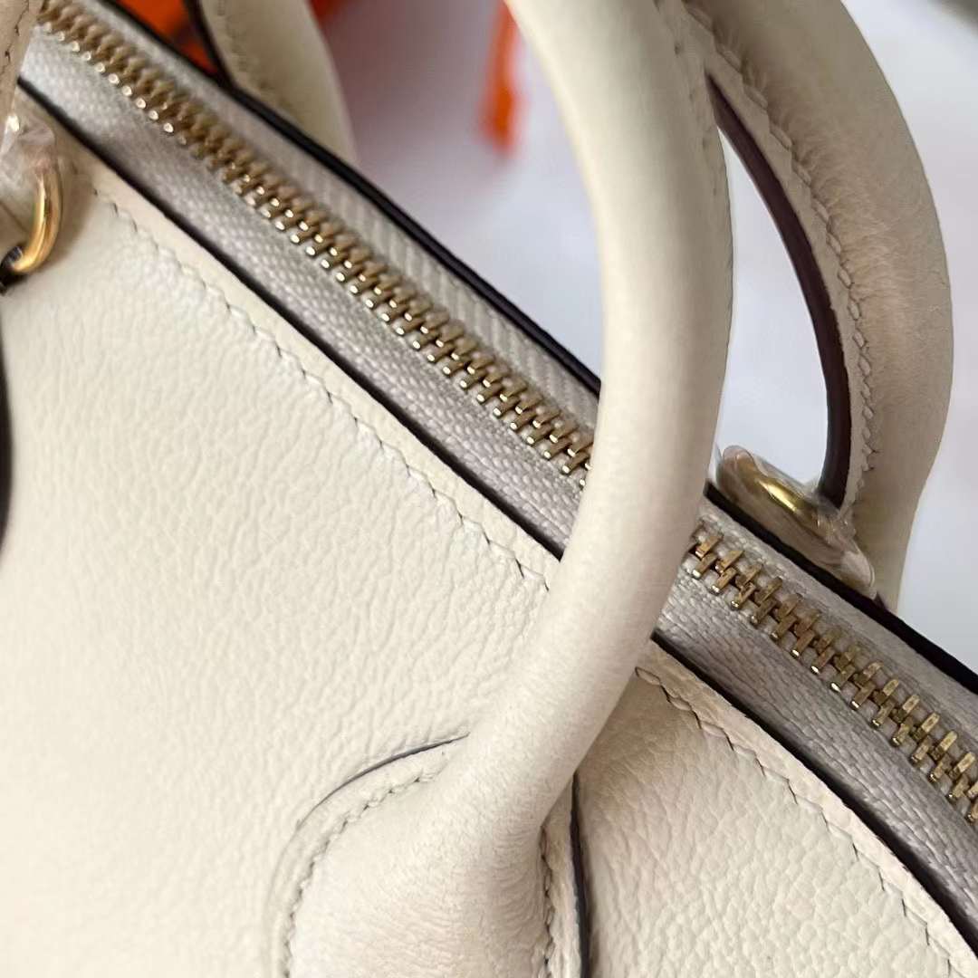 Hermès（爱马仕）Mini Bolide 迷你保龄球包 Chevre 进口山羊皮 i2 奶油白 金扣 19cm 全手工蜡线缝制 Ghw