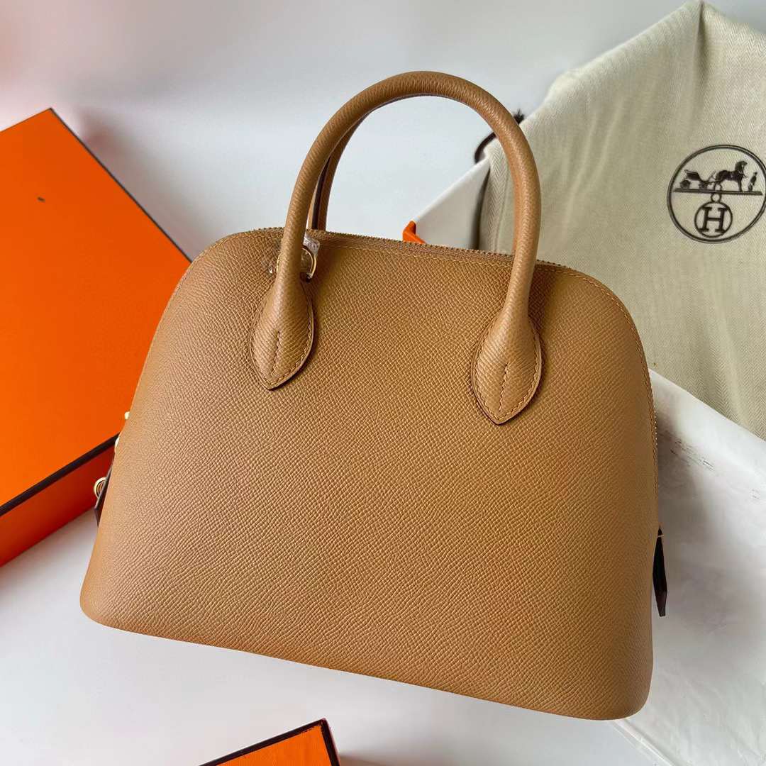Hermès（爱马仕）Bolide 保龄球包 Epsom 0M 奶茶色 金扣 25cm 全手工蜡线缝制 Ghw