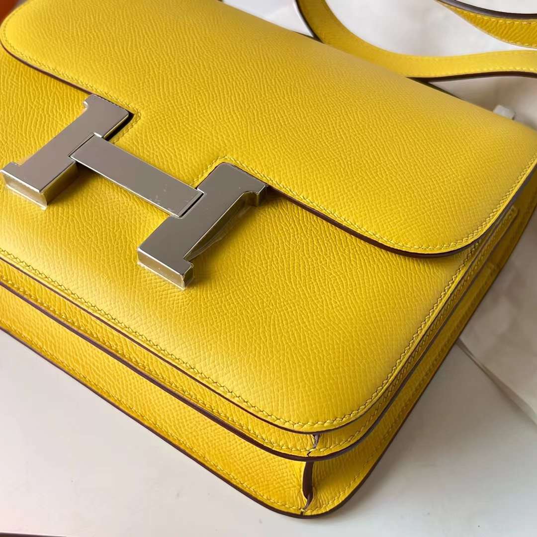 Hermès（爱马仕）Constance 空姐包 Epsom 9O 那不勒斯黄 Jaune de Naples 银扣 24cm Phw 全手工蜡线缝