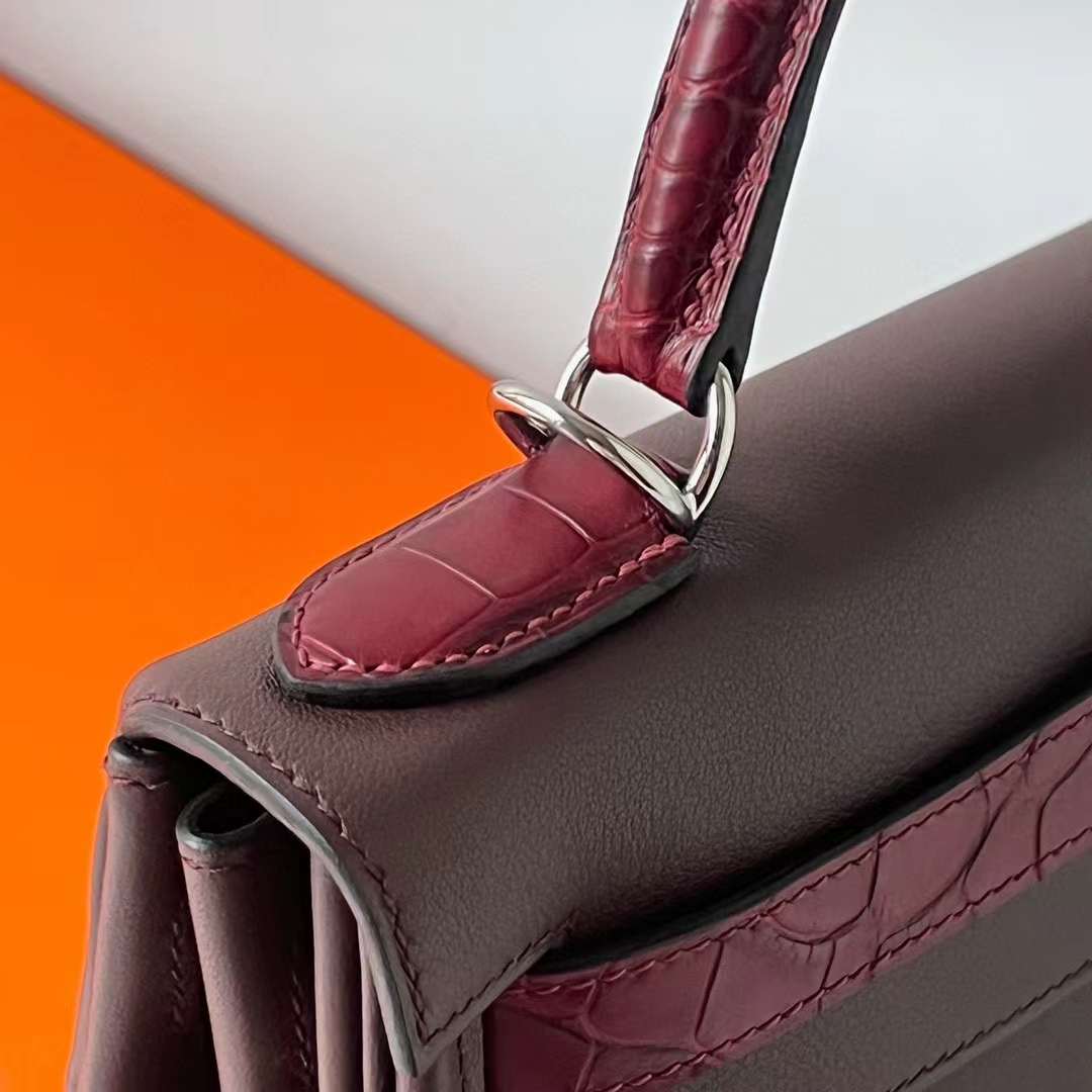 Hermès（爱马仕）Kelly 凯莉包 Swift 拼 雾面鳄鱼皮 0G 马鞍红 银扣 28cm 全手工蜡线缝 Phw