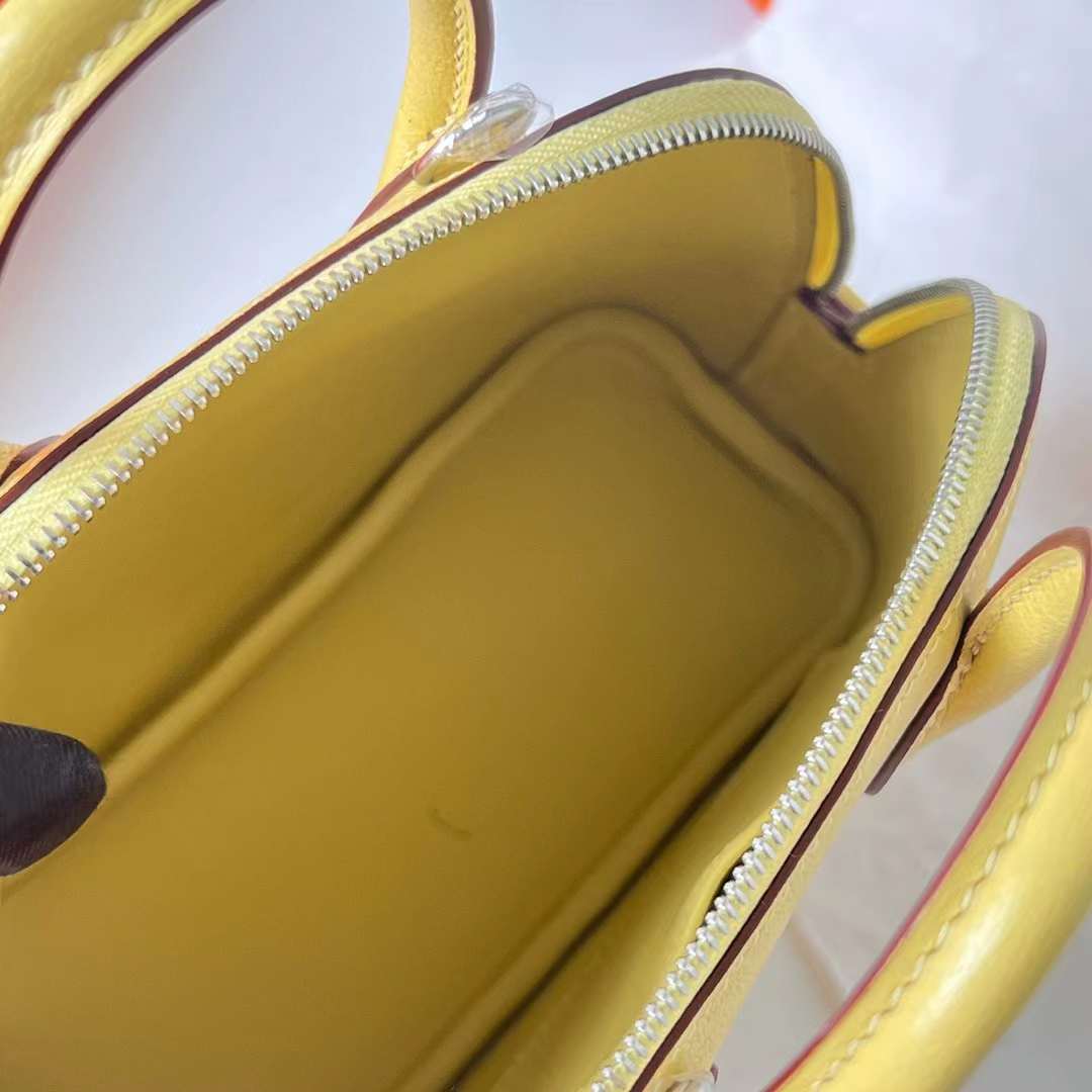 Hermès（爱马仕）Mini Bolide 迷你保龄球包 Chevre 进口山羊皮 0Y 柠檬黄 银扣 20cm 全手工蜡线缝 Phw