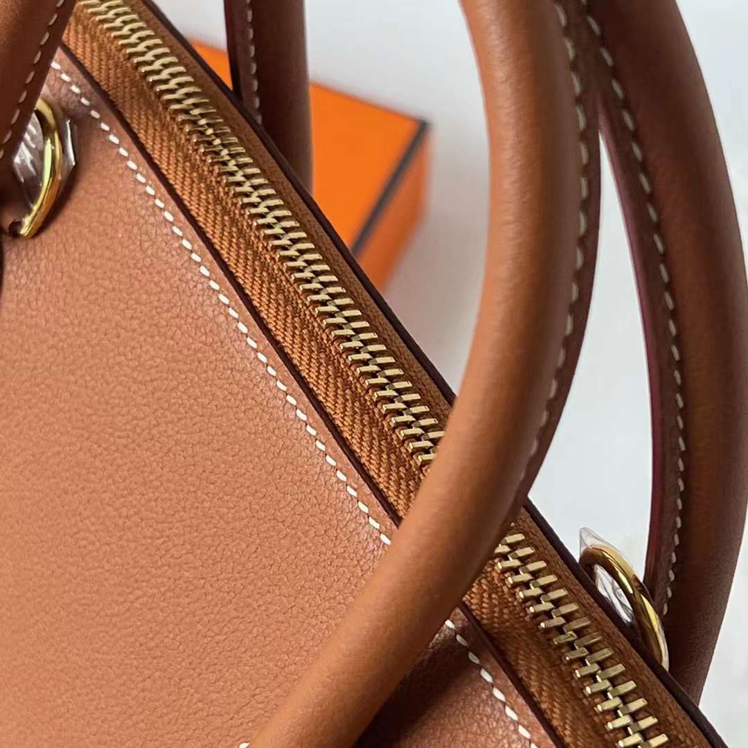 Hermès（爱马仕）Bolide 保龄球包 Evercolor Ck37 金棕色 内拼 P9 海葵紫 金扣 25cm 全手工蜡线缝 Ghw