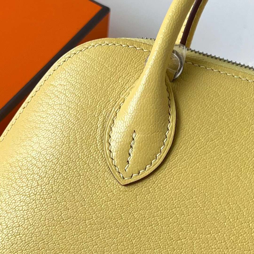 Hermès（爱马仕）Mini Bolide 迷你保龄球包 Chevre 进口山羊皮 0Y 柠檬黄 银扣 20cm 全手工蜡线缝 Phw