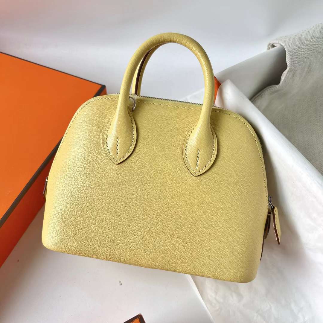 Hermès（爱马仕）Mini Bolide 迷你保龄球包 Chevre 进口山羊皮 0Y 柠檬黄 银扣 20cm 全手工蜡线缝 Phw