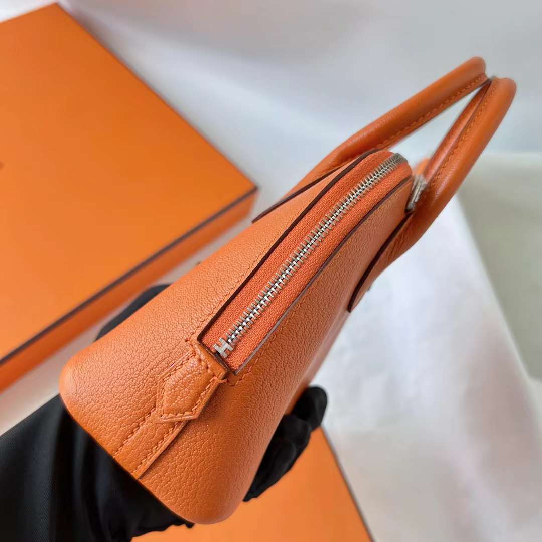 Hermès（爱马仕）Mini Bolide 保龄球包 Chevre 进口山羊皮 Ck93 橙色 银扣 20cm 全手工蜡线缝 Phw