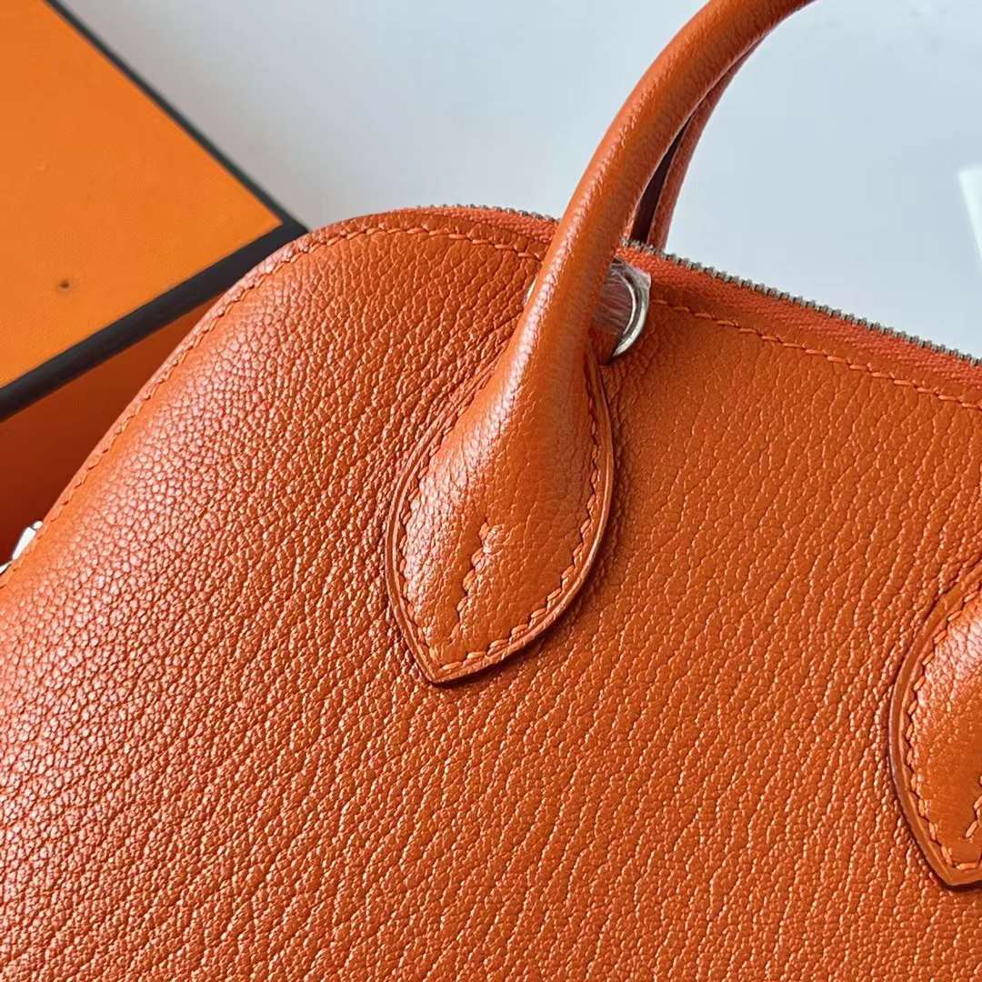 Hermès（爱马仕）Mini Bolide 保龄球包 Chevre 进口山羊皮 Ck93 橙色 银扣 20cm 全手工蜡线缝 Phw