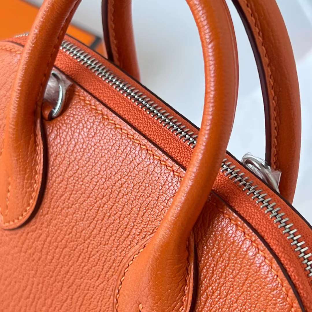 Hermès（爱马仕）Mini Bolide 保龄球包 Chevre 进口山羊皮 Ck93 橙色 银扣 20cm 全手工蜡线缝 Phw