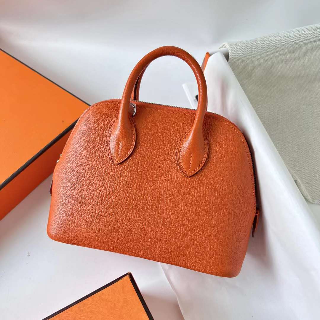 Hermès（爱马仕）Mini Bolide 保龄球包 Chevre 进口山羊皮 Ck93 橙色 银扣 20cm 全手工蜡线缝 Phw