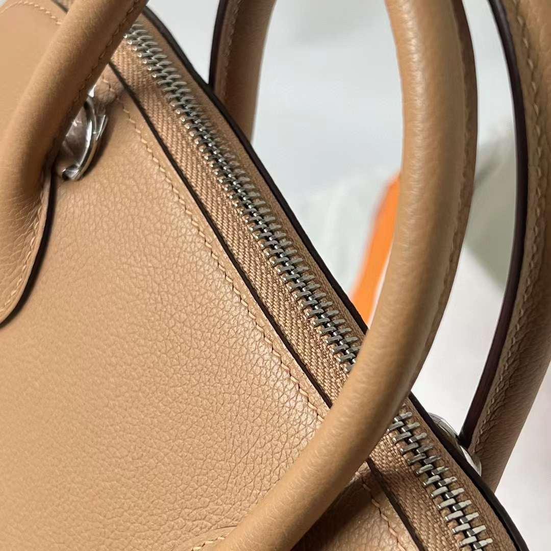 Hermès（爱马仕）Bolide 保龄球包 Evercolor 0M 奶茶色 内拼 X9 锦葵紫 银扣 25cm 全手工蜡线缝 Phw