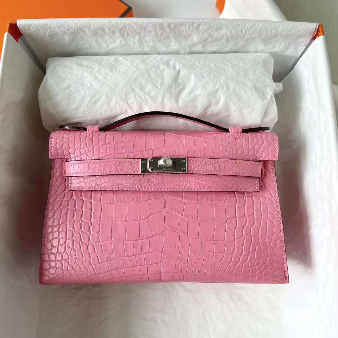 Hermès（爱马仕）Mini Kelly Pochette 雾面美洲鳄鱼皮 5P 樱花粉 银扣 22cm 全手工蜡线缝 Phw